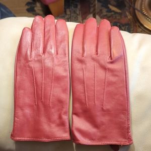 Vintage women's red leather gloves.